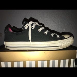 Black and pink low cut converse